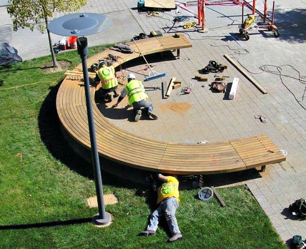 Builders working on benches