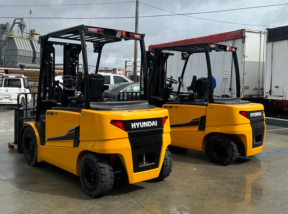 Two Electric Forklifts Image #1